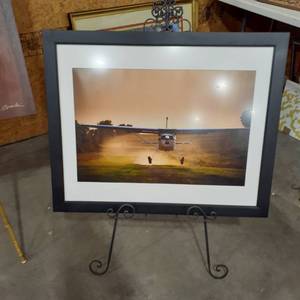 lot 1559 image: Home decor. Cessna plane. 25 x 31. Comes with easel and a poster of soaring eagle (15 x 37)