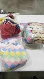 lot 2209 image: Doll clothes and blankets