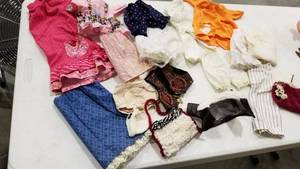 lot 2217 image: Doll clothes