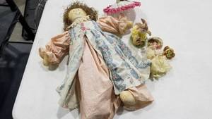 lot 2219 image: Cloth doll, small porcelain doll and bunny decor