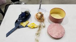 lot 2220 image: Doll hats, box and doll stand