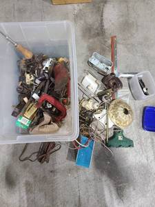 lot 4044 image: Tote of electrical suppliesparts, hatchet head, clamp, more