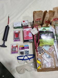 lot 4068 image: GFCI, corner braces, screws, safety goggles, roll of safety walk