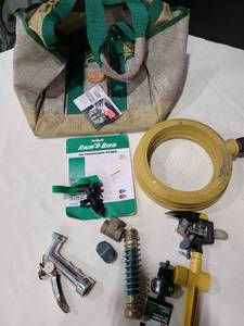 lot 4101 image: Gardening bag and sprinklers