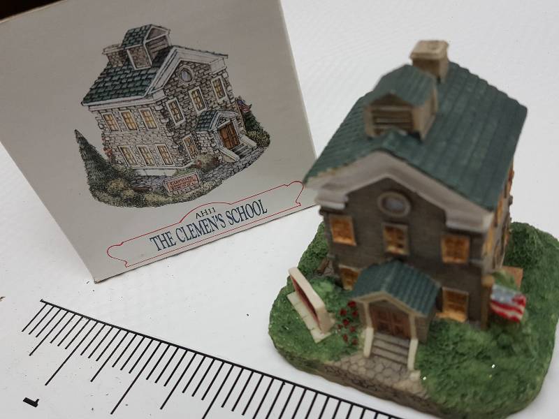 lot 8468 image: Ceramic table top piece sold by Dillards in the 90s as a collectable depicting shops from Liberty Falls