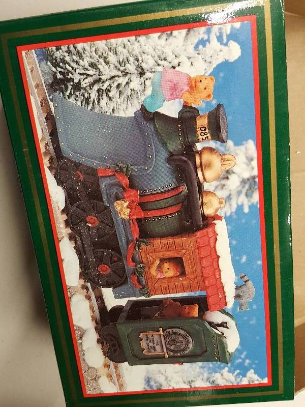 Three metal North Pole Express Train and picture frame 