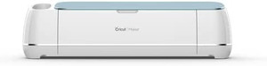 lot 13187 image: Cricut Maker in Blue & Digital Content Library Bundle - Smart Cutting Machine - Cuts 300 Materials, Home Decor & More, Bluetooth Connectivity, Compatible with iOS, Android, Windows & Mac