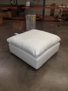 lot 60 image: Large 40inch Square White Leather Ottoman has some dust and dirt from the warehouse on it