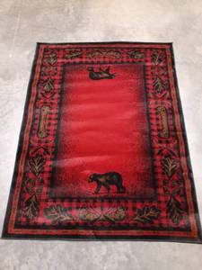 lot 109 image: Red and Black 4ft x 6ft Area Rug with Bears on it