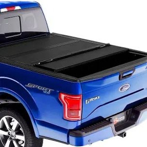 lot 2400 image: Truck bed cover 59312 68�� wide