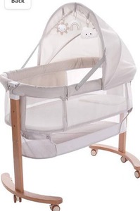 lot 3329 image: Baby Bassinet Bedside Sleeper with Wheels Storage Basket Canopy 3 Hanging Toys Newborn Cosleeping Cribs for Infant Wooden Crib Adjustable Boy Girl Multi-Functional Bedside Sleeper