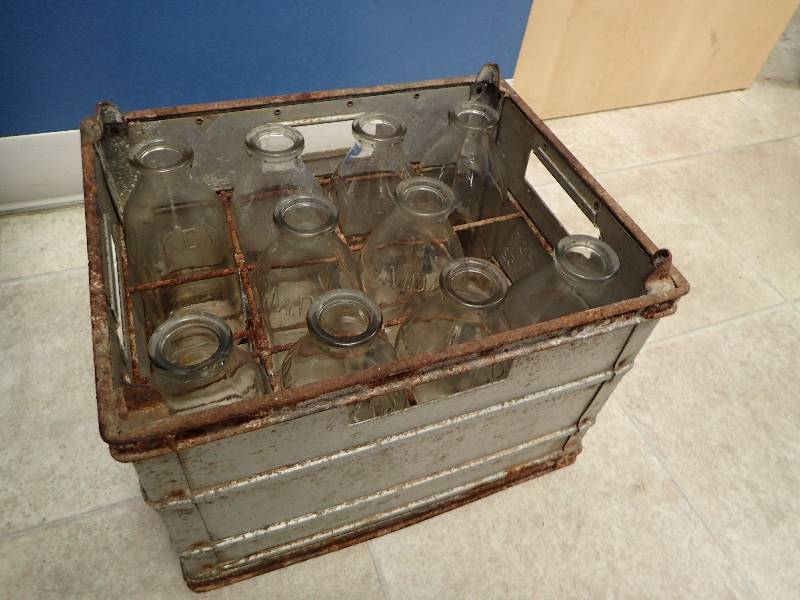 lot 1552 image: Old Fashioned Metal Bottle Crate w Glass Bottles