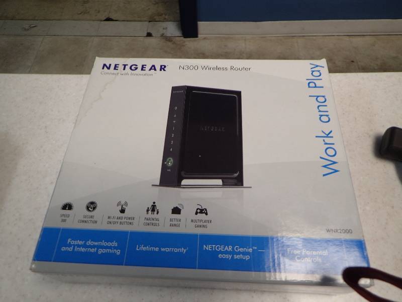 lot 1561 image: Netgear New in Box Modem
