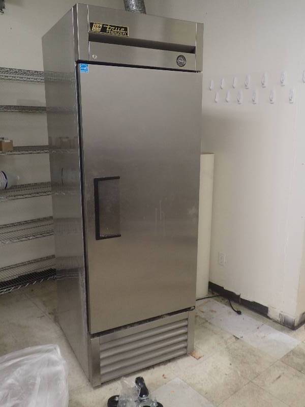 lot 1591 image: True Single Door Reach in Commercial Freezer w Casters
