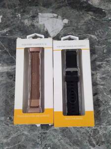 lot 30376 image: Fitbit Accessory Bundle  (2pcs)  (See photos)  (SOLD AS IS)
