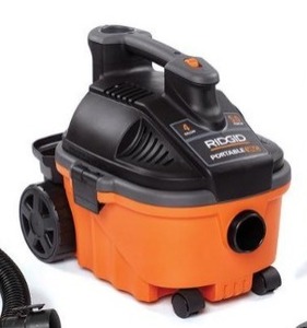 lot 2458 image: RIDGID 15L (4 Gal.) 5.0 Peak HP Portable WetDry Shop Vacuum with Large Rear Wheels & Storage