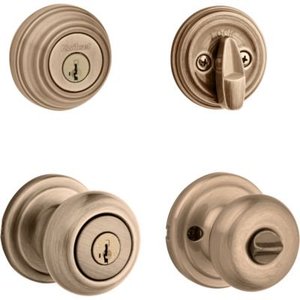 lot 2599 image: Kwikset 991 Juno Keyed Entry Knob And Sgl Cyl Deadbolt Combo Pack Featuring SmartKey Security�� In Antique Brass Model # 99910-033