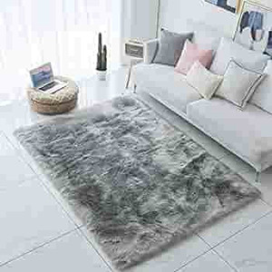 lot 4503 image: Carvapet Shaggy Soft Faux Sheepskin Fur Area Rugs Faux Fur Floor Mat Luxury Beside Carpet for Bedroom Living Room 8ft x 10ft, Grey