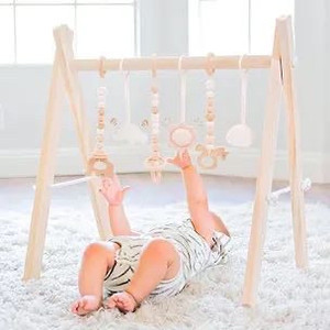 lot 4907 image: Baby Play Gym Wooden Baby Gym with 6 Toys Foldable Play Gym Frame Activity Gym Hanging Bar Baby Toy White