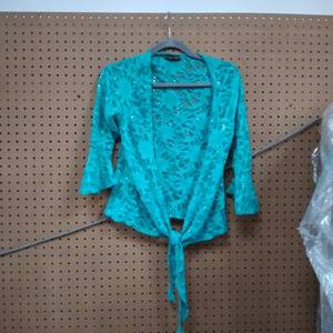 lot 1110 image: CHOCOLATE PICKLE SHEER COVER JACKET  LOOKS TO BE SMALL