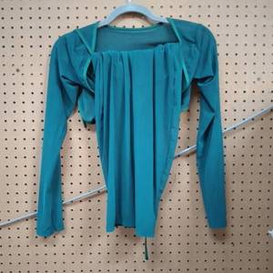 lot 1117 image: SHEER COVER TOP WITH SKIRT  SIZE S
