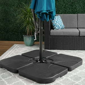 lot 81324 image: Westin Outdoor 4-Piece Universal Standard Cross Base Umbrella Weights for Cantilever Patio Umbrella Black