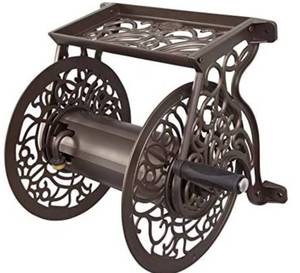 lot 75571 image: Liberty GARDEN 704 Decorative Cast Aluminum Wall Mount Garden Hose Reel, Holds 125-Feet of 58-Inch Hose - Bronze