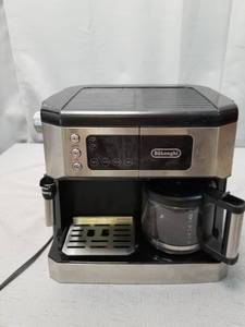 lot 6682 image: Used See Pictures DeLonghi All-in-One Combination Coffee Maker & Espresso Machine  Advanced Adjustable Milk Frother for Cappuccino & Latte  Glass Coffee Pot 10-Cup, COM532M
