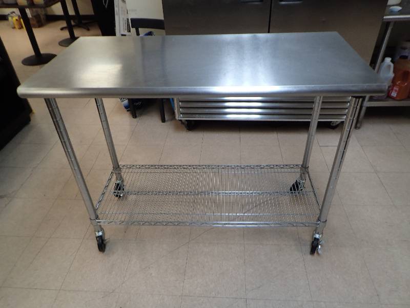 lot 1815 image: Stainless Work Top Table With Metal Wire Undershelf On Castors