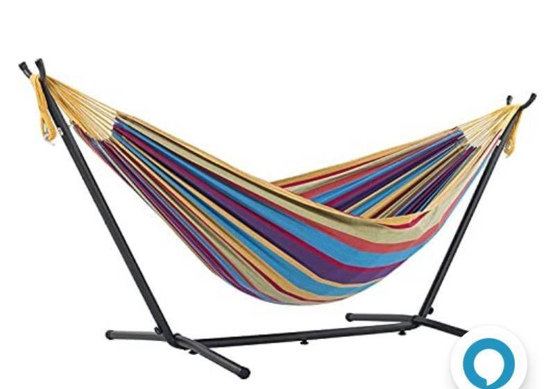lot 70351 image: Vivere Double Cotton Hammock with Space Saving Steel Stand, Tropical (450 lb Capacity - Premium Carry Bag Included)