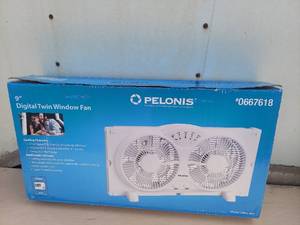 lot 3754 image: PELONIS 9-in 3-Speed Window Fan