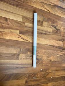 lot 1893 image: Full roll of peel and stick white wallpaper. 23 12 inches wide by