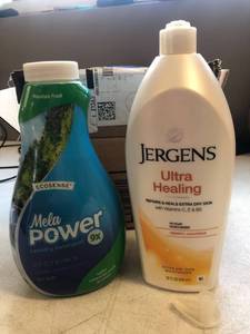 lot 1940 image: mixed lot Mela Power laundry detergent and Jergens lotion