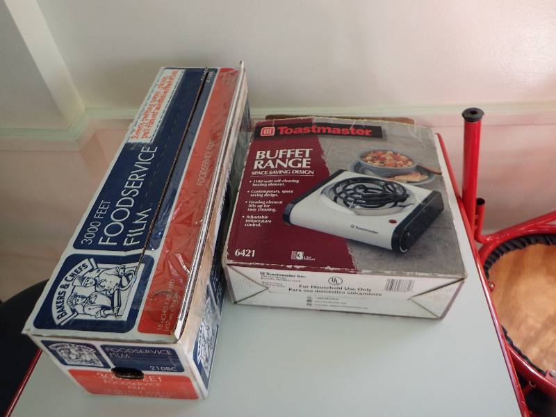 lot 1886 image: Large Partial Roll Of Food Service Film With Totes Master Countertop Buffet Range