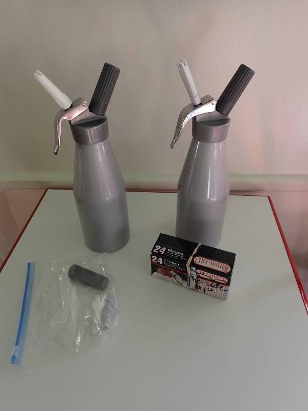 lot 1889 image: (2) Refillable ISI Whip Cream Charge Pumps