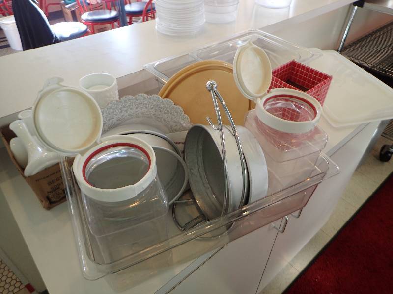 lot 1906 image: Large Lot Of Clear Plastic Jars With Table Top Flower Vases And Storage Containers And Lids