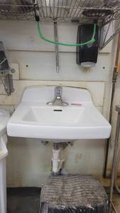 lot 10152 image: White Handwashing Sink amd a Soap Dispenser