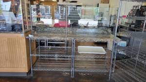 lot 10398 image: 75in Stainless Steel Counter W a Granite Top and a Sneeze Gaurd