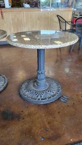 lot 10407 image: 30in Granite Table W a Decorative Cast Iron Base