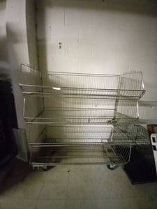 lot 15331 image: Metal display shelf wirh 4 shelves on Casters