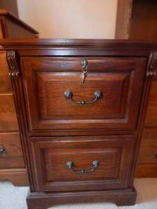 lot 2902 image: Dark Wood File Cabinet..