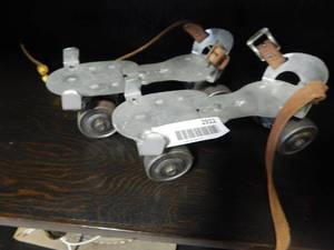 lot 2922 image: Vintage Metal Roller Skates.
