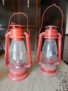 lot 2710 image: Red Oil Lanterns (2)- Sun and Winged Wheel