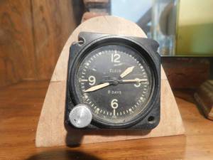 lot 2761 image: Elgin Eight Day Clock WWII Military Airplane Clock