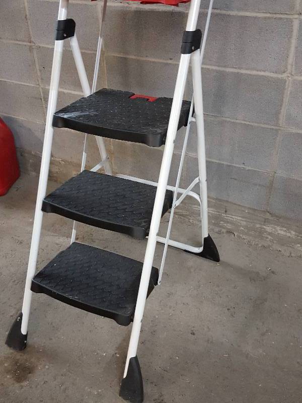 Very nice Costco fold up and away step ladder for painting or dusting