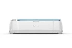 lot 6278 image: Cricut Maker in Blue & Digital Content Library Bundle - Smart Cutting Machine - Cuts 300 Materials, Home Decor & More, Bluetooth Connectivity, Compatible with iOS, Android, Windows & Mac (B09YH1J4PK) Retail$383.93