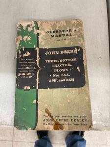 lot 14 image: vintage John Deere plow owners manual