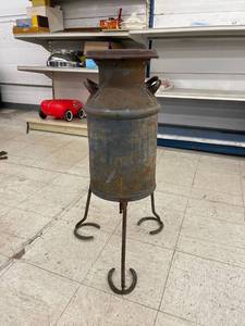 lot 36 image: milk can plant stand