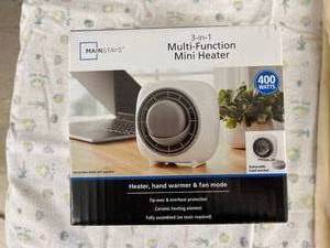 lot 3946 image: factory sealed mini heater