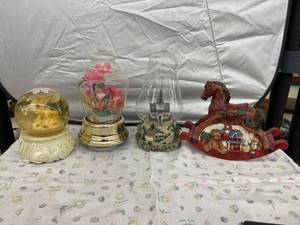 lot 4024 image: snow globe 2 in glass domes & a red rocking horse